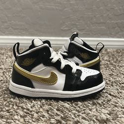 Jordan 1 Mid Black, Gold, and White