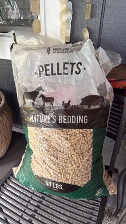Almost full, I only used 3 cups out of the bag and I bought it last week, pine pellets