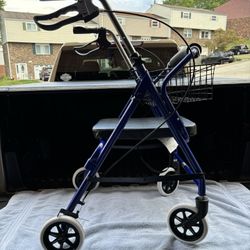 LIK NEW WALKER WITH BRAKES,SEAT AND BASKET