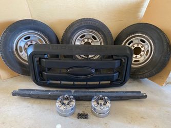 Ford F250/F350 Super Duty OEM Package – Michelin Tires, OEM Grille, 4 Center Caps & 24 Lug Nuts