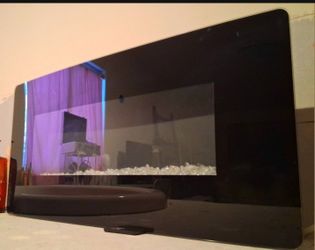 Electric Wall Fireplace
Beautiful electric wall-mounted fireplace with colorful adjustable LED lights to match your mood.
Gets hot in seconds with LED