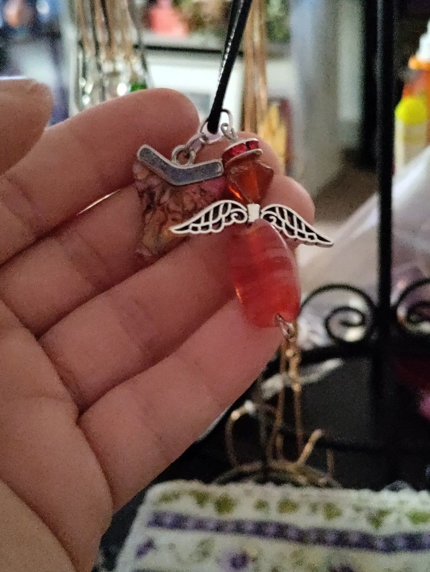 Beautiful Red Angel With Stone Shaped Shark Tooth