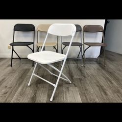 Brand new White folding chairs in box