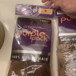 2 Packs Of Human Hair Extensions . Brand New 