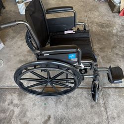 Wheel Chair with Leg Rests $85