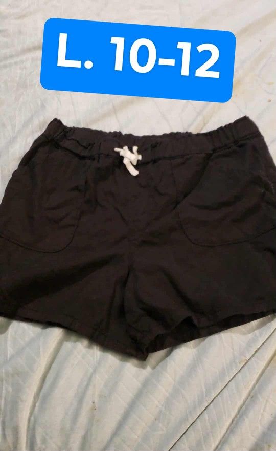 L - 10'12 Black Shorts Still Available