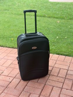 Rolling suitcase - 20”L X 15”H X 9”W