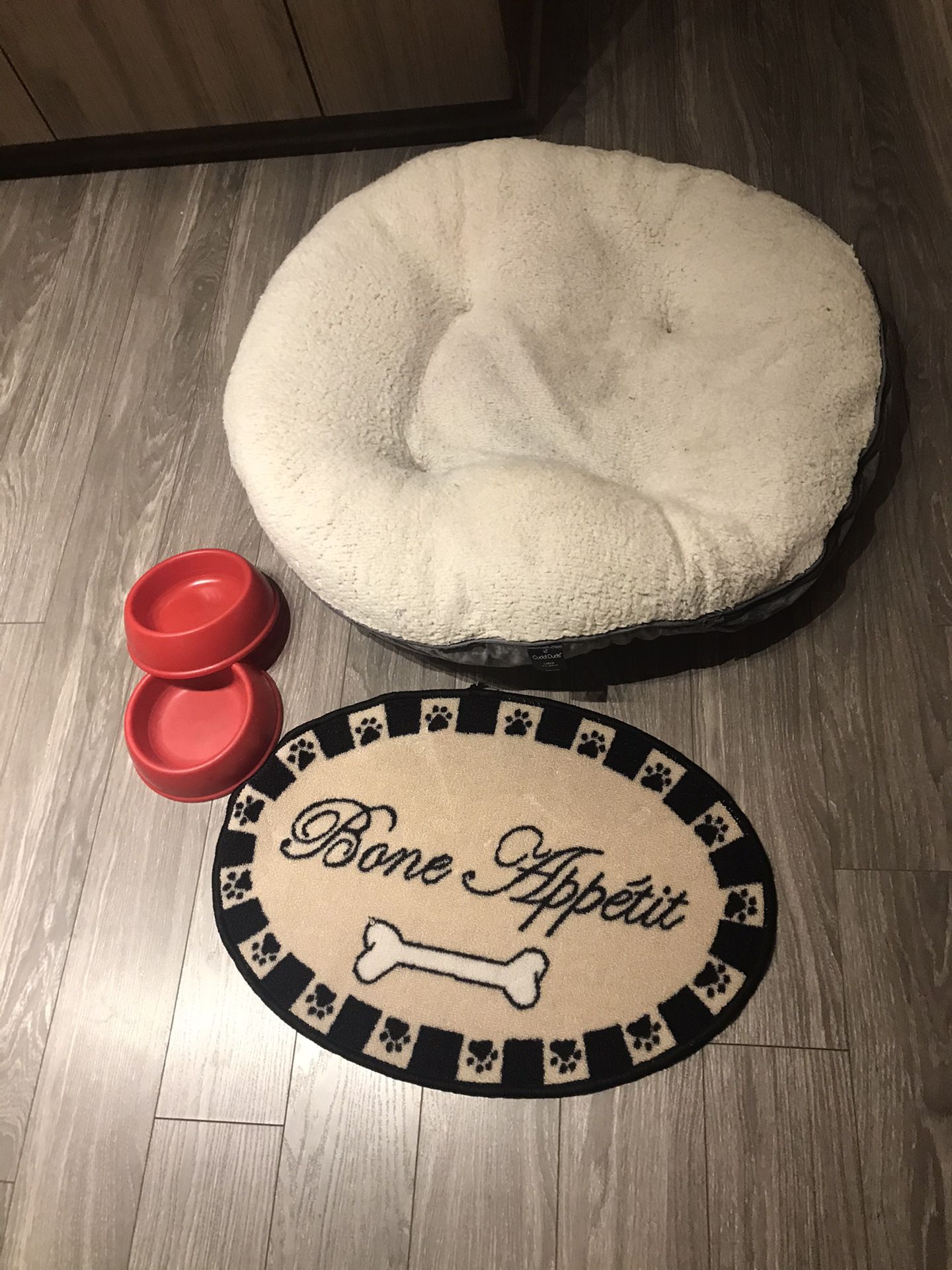 Plush round dog bed, bone appetit dog bowl mat and complementary dog bowls
