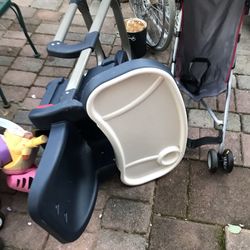 A Stroller And A Hight  Chair