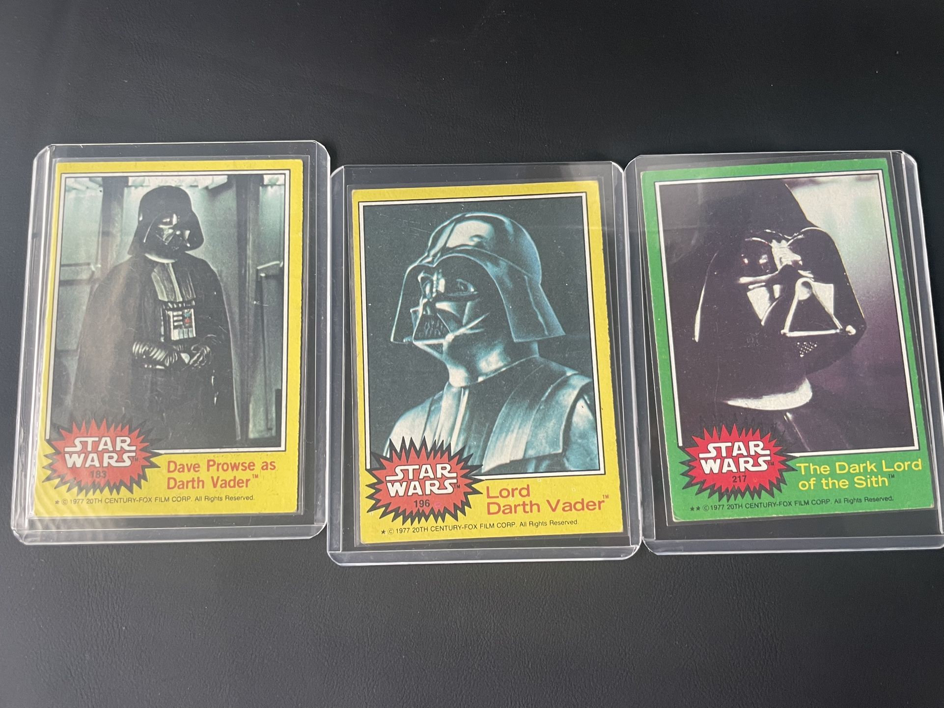 Three 1977 Star Wars Darth Vader Cards