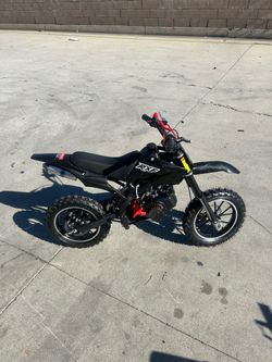 49cc 2-Stroke Gas Dirt Bike for Kids 8-14, Mini Dirtbike with Dual Disc Brakes, Pull Start, Off-Road Tires, 25MPH Max Speed, Youth Motocross Pit Bik