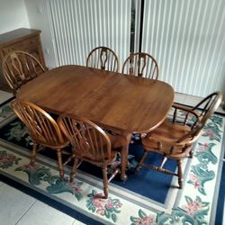 Solid Hardwood Kitchen Table And Six Chairs In Excellent Condition Comes With Unfolding Cover $200