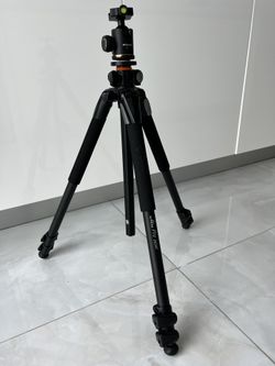 Tripod For Camera With A Separate Arraying Head