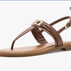 Beautiful designer women's Sandels.  Brand new still in box never opened