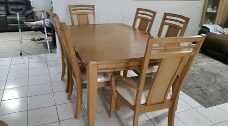 Light Brown Wood Dining Table And Chair Set - 6 Pieces.
