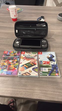 Nintendo switch light and three games