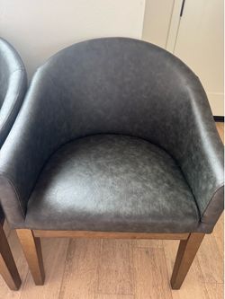 Dark barrel dining chairs