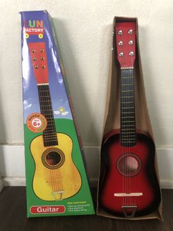 Kids play guitar 