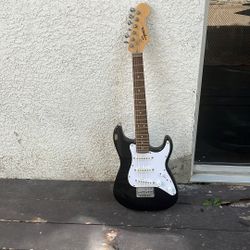 Squier Guitar, Black, White, And Brown,35 Inches 