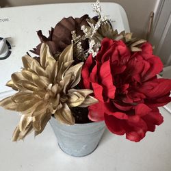 Artificial Flowers In A Galvanized Pot