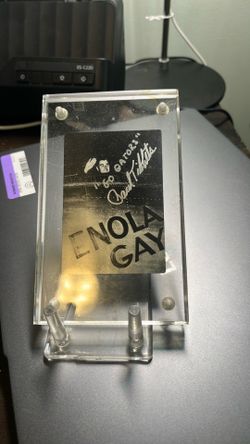 Signed Enola Gay with signed photo of pilot (former Gator student) Paul Tibbits