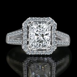 2 CT intensely Radiant Emerald Diamond Veneer cubic zirconia split shank set in Sterling Silver Engagement/Wedding Ring. 635R4013
