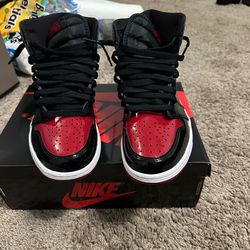 Jordan bred patent leather 1’s.  Size 9