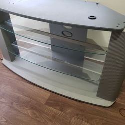 Entertainment Center 24 "Inches Tall X 47"Inches  Wide And  19 " Inches Deep With Glass Shelves 