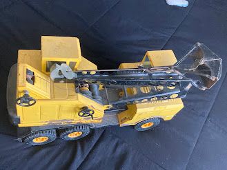 This is 100% a Nylint pressed‑steel construction truck  Vintage