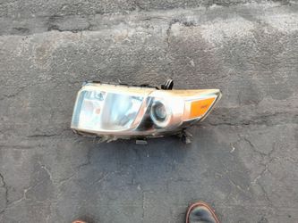 2011-2015 Scion Xb headlight (driver's side) oem.