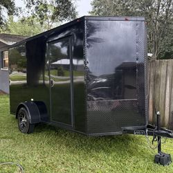 ENCLOSED 6x12 premium BLACKED OUT trailer. 