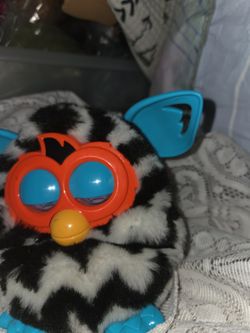 Furby...works. Talks , Moves Etc 