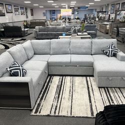 Gray sectional Couch with storage space And Bed