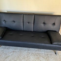 Brand New Convertible Couch Never Used.