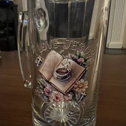 26.6 Glass Mug With a Bible Picture On It. 