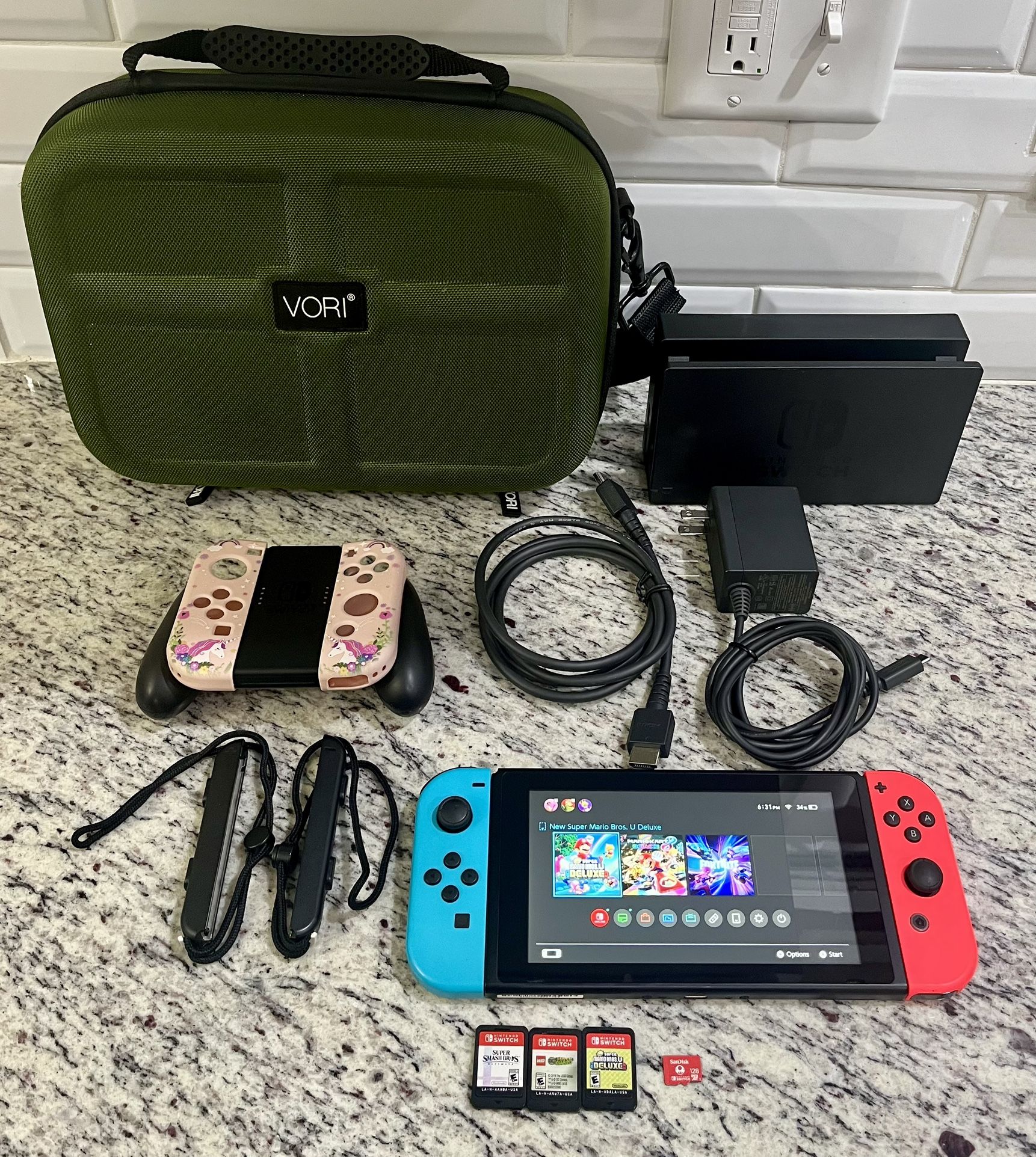 Nintendo Switch with accessories and games 