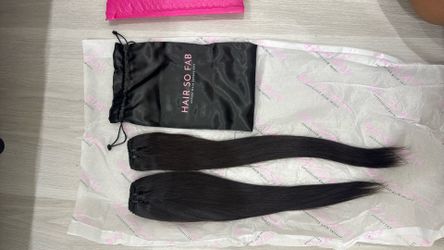 2 BRAND NEW HUMAN HAIR BUNDLES. NEVER USED