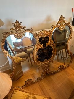 Ornate Gold Baroque Wall Mirror with a marble middle