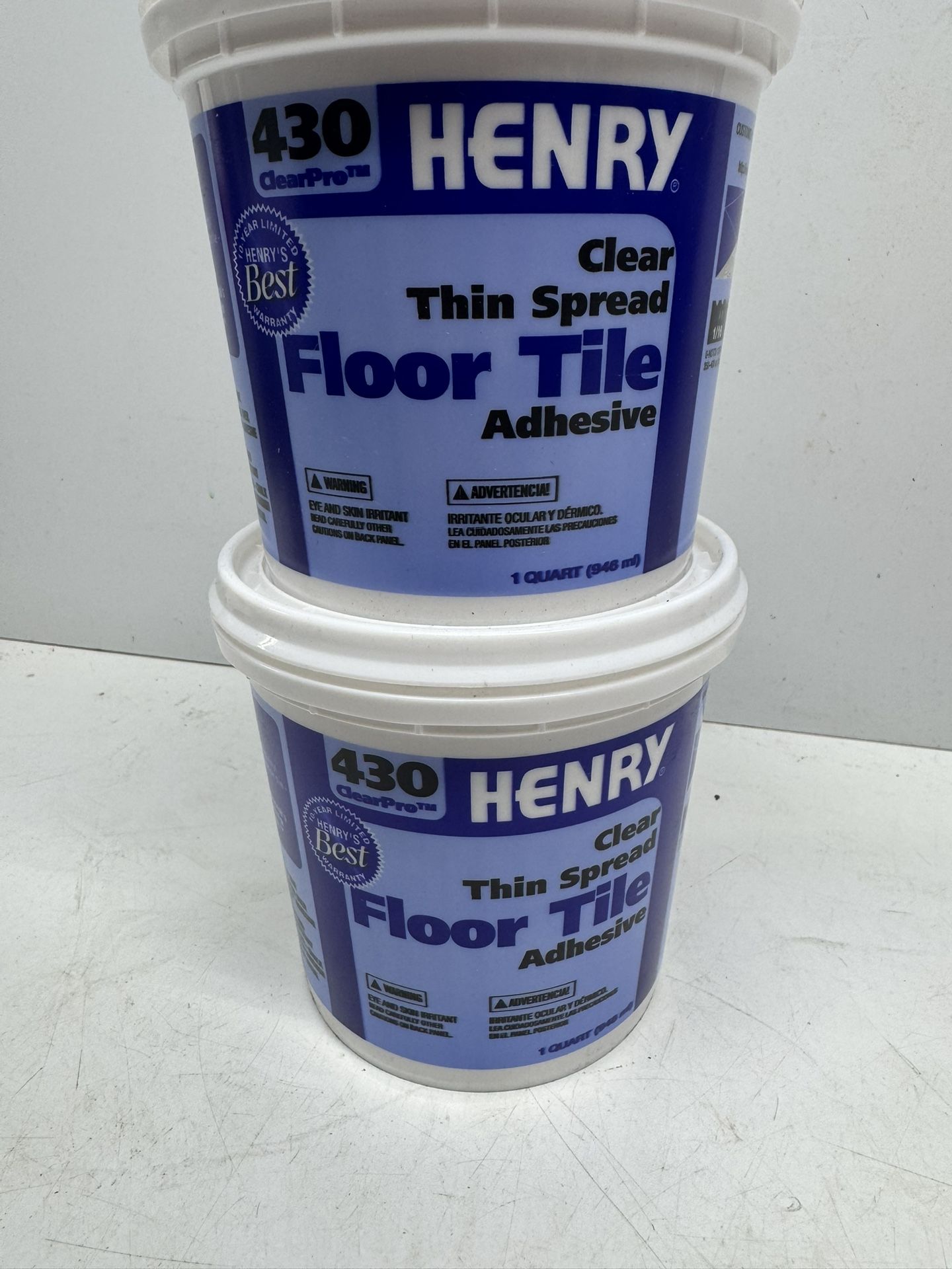 Henry Floor Tile Adhesive Quarts. $10 Takes Both Qts. Must Pickup