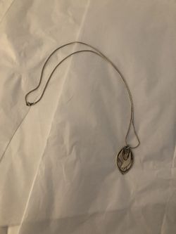 Holy Spirit and cross vintage necklaces