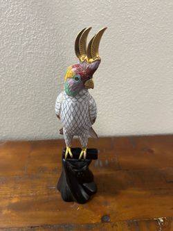 Vintage Chinese cloisonné cockatoo figurine perched on a carved wooden stand