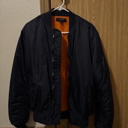 Navy Blue bomber jacket with orange lining