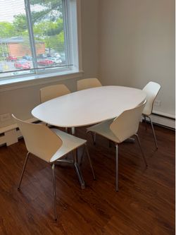 IKEA Minimalist Dining Set – Oval Table & 5 Stackable Chairs