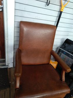 2 brown leather captain chears