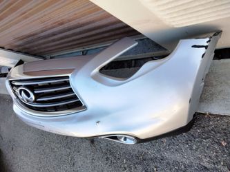 2014-2017 Infiniti QX70 FX35 Qx50 front bumper with all the accessories and parking assistance sensors OEM.