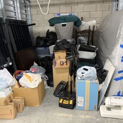 Storage Unit For Sale With California King Bed And New Clothing