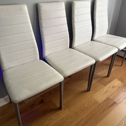 White faux leather Dining chairs