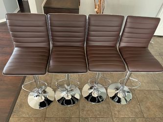 Brand New In Box / Set Of 4 brown Bar Stools (executives) / brown Pub Stools / Adjustable Height And Swivel / Price Is Firm / Pick Up Only