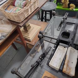 A Little Hard To See But It Two Small Glass Tables With Black Medal And Two Small Wooden Tables Stacked On Each Other $15 Each All 4 For $50