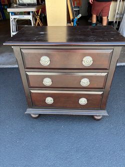 brown short dresser/night stand